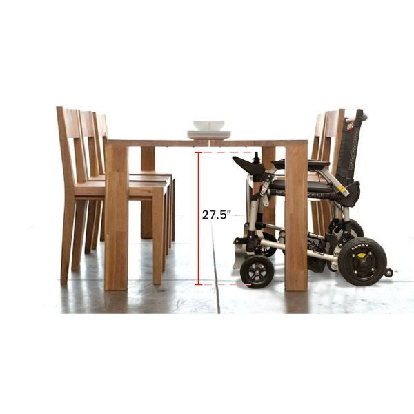 Zoomer power chair under a table
